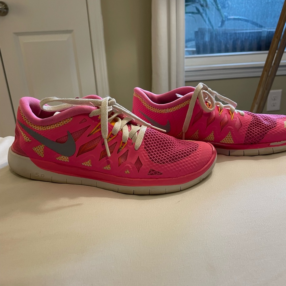 Pink Nike free runs size 6